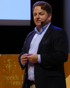 Foto på Fredrik Blix när han håller ett seminarium.